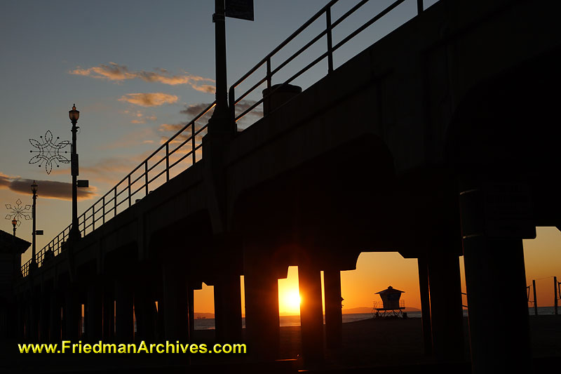 pier,sunset,silhouette,lifeguard,orange,landmark,huntington beach,